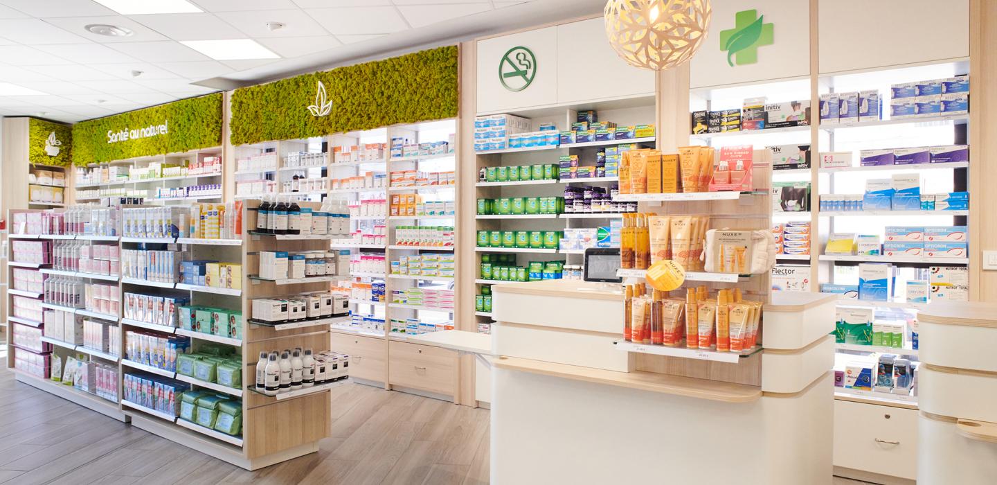 Comptoirs d'accueil de pharmacie en bois et blanc avec suspensions lumineuses design